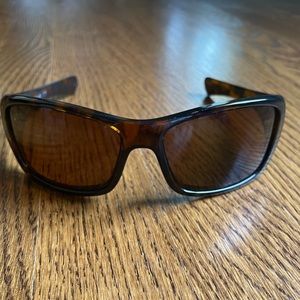 Oakley Hijinx Tortoise Sunglasses with bronze symbol